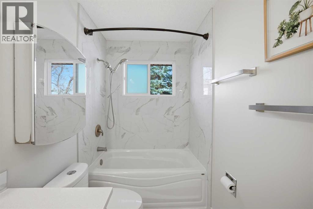 Single Family House Bungalow for Sale in  Wood Oak Way SW Woodlands Calgary 