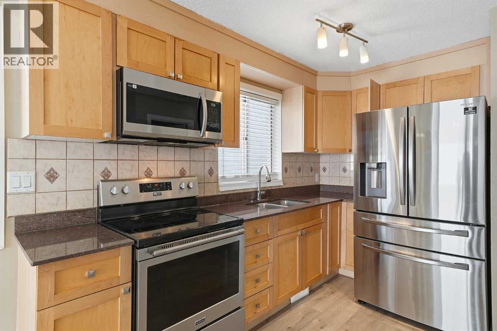 Single Family House Bi-level for Sale in  Falmere Way NE Falconridge Calgary 