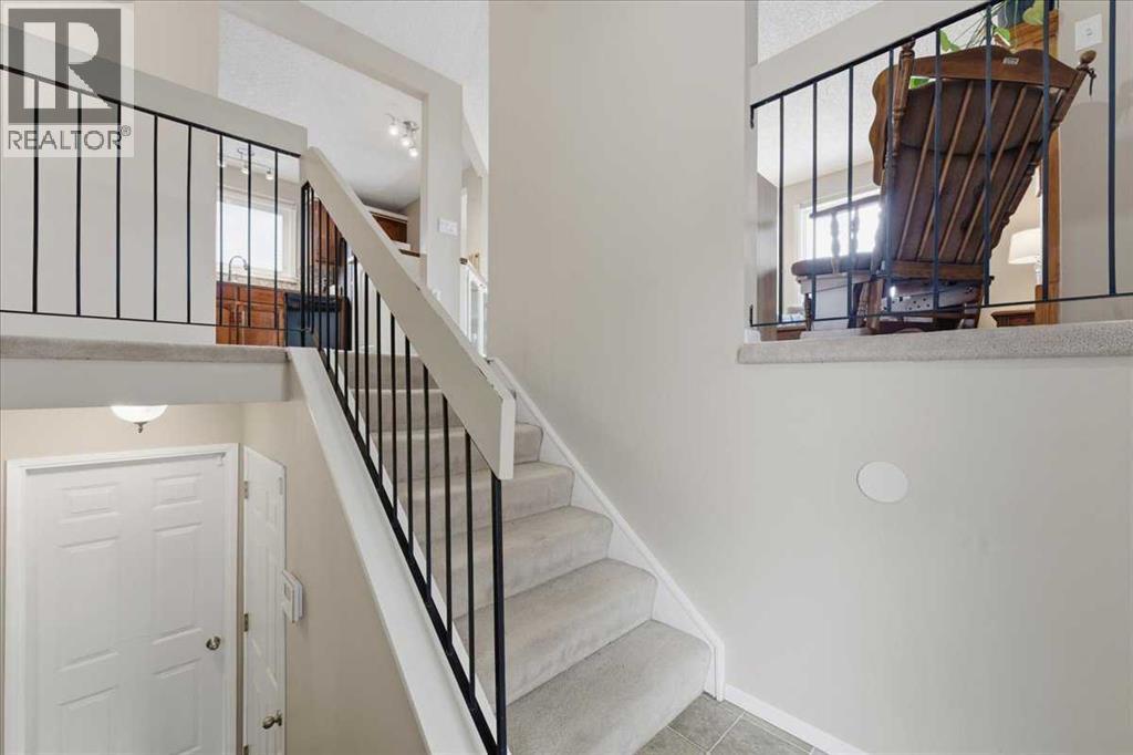 Single Family House Bi-level for Sale in  Macewan Glen Drive NW MacEwan Glen Calgary 