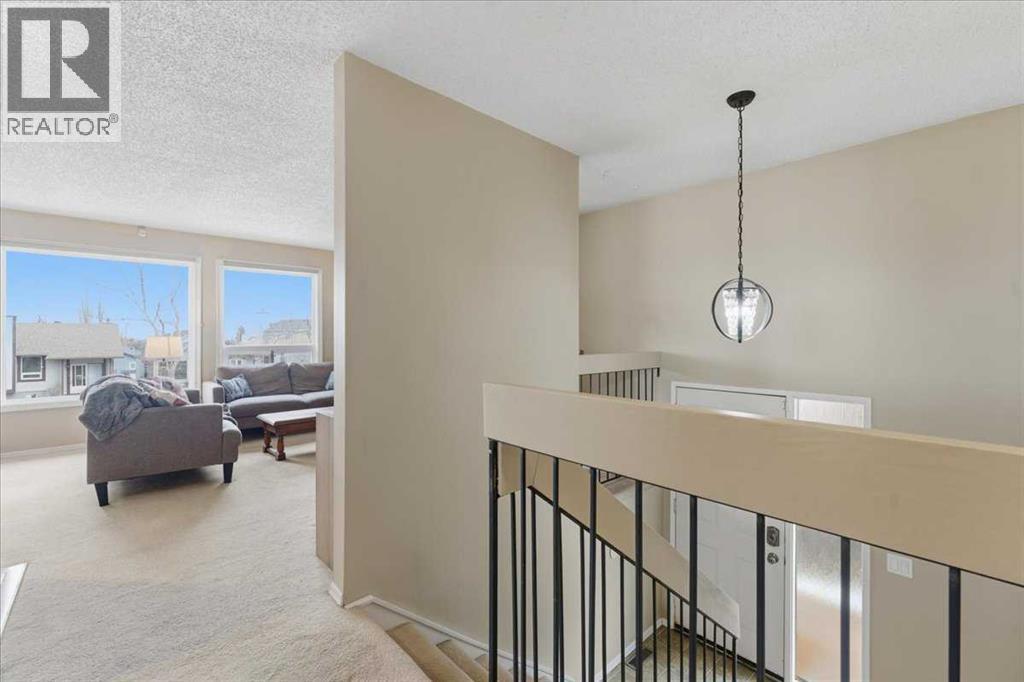 Single Family House Bi-level for Sale in  Macewan Glen Drive NW MacEwan Glen Calgary 