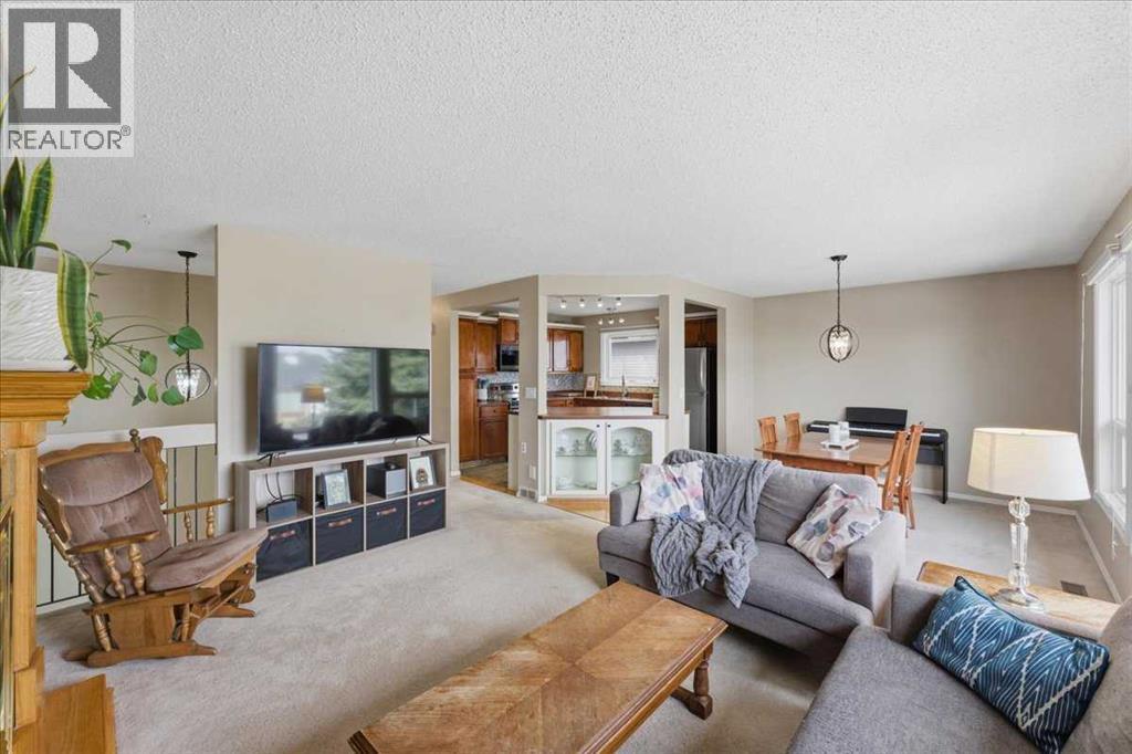 Single Family House Bi-level for Sale in  Macewan Glen Drive NW MacEwan Glen Calgary 