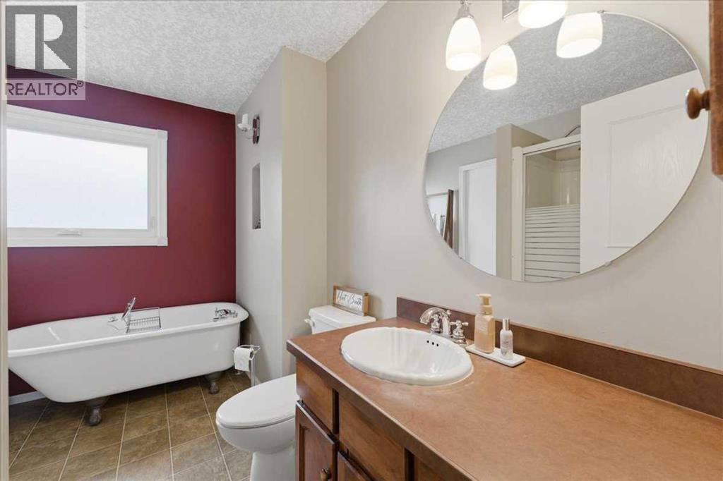 Single Family House Bi-level for Sale in  Macewan Glen Drive NW MacEwan Glen Calgary 