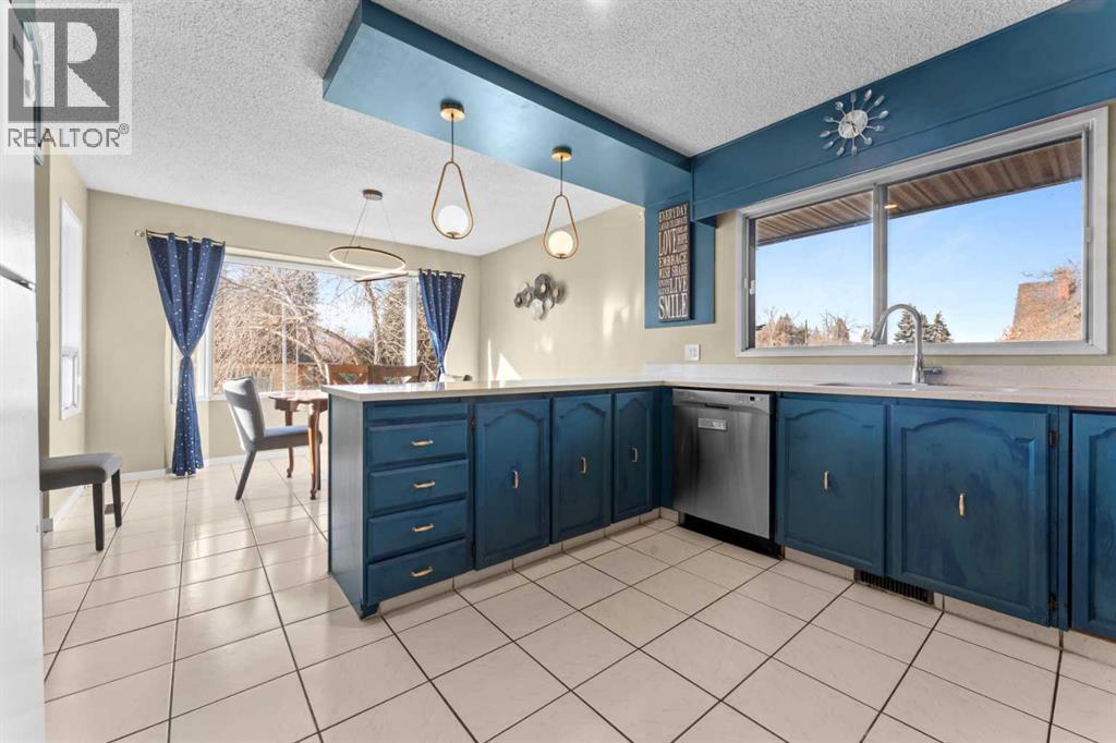 Multi-family House Bi-level for Sale in  &   Street NW Mount Pleasant Calgary 