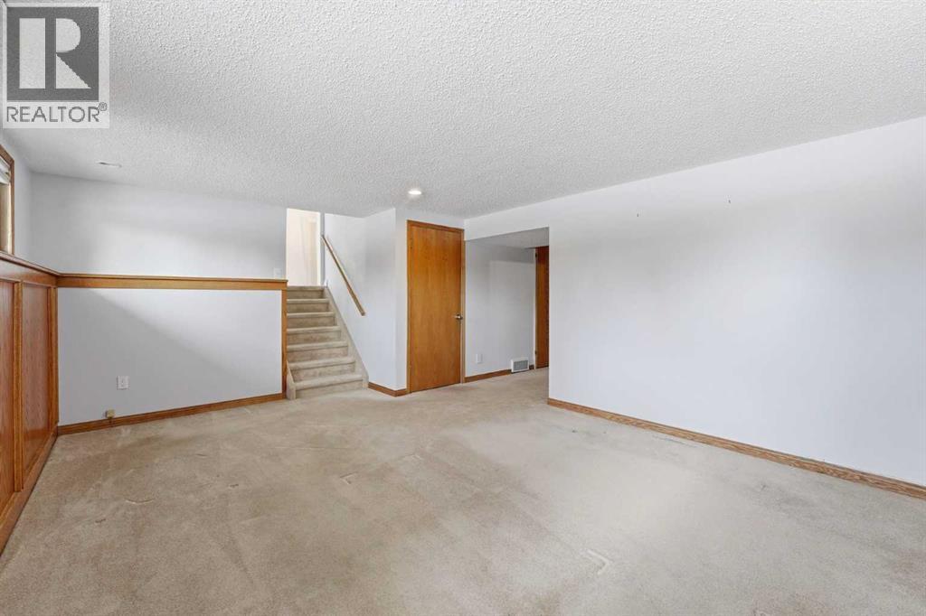 Single Family House 4 Level for Sale in  Brockington Road NW Brentwood Calgary 