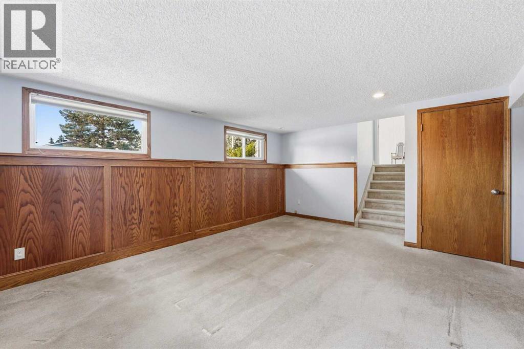 Single Family House 4 Level for Sale in  Brockington Road NW Brentwood Calgary 