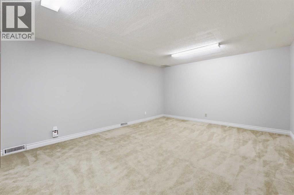 Single Family House 4 Level for Sale in  Brockington Road NW Brentwood Calgary 