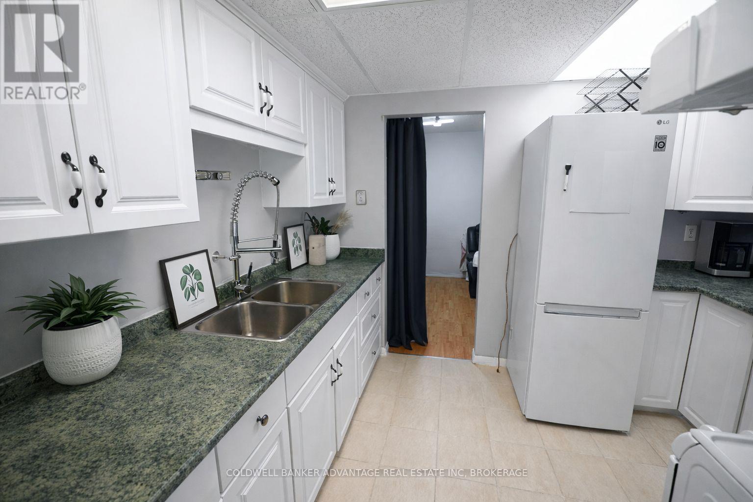 #102 4692 CRYSLER AVENUE - 6