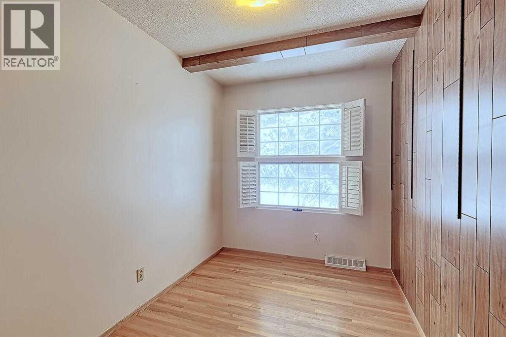 Single Family House Bi-level for Sale in  Woodland Crescent SE Willow Park Calgary 