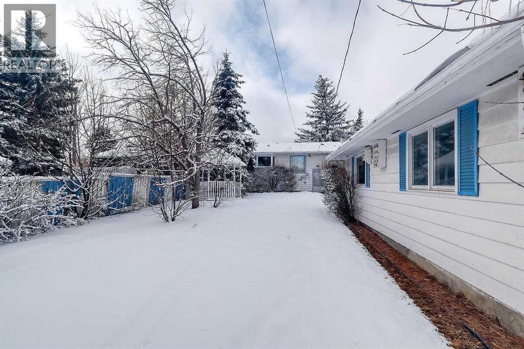 Single Family House Bi-level for Sale in  Woodland Crescent SE Willow Park Calgary 