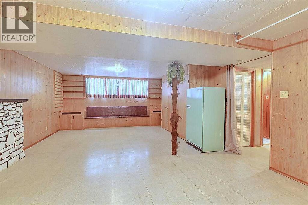 Single Family House Bi-level for Sale in  Woodland Crescent SE Willow Park Calgary 