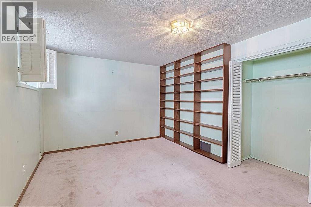 Single Family House Bi-level for Sale in  Woodland Crescent SE Willow Park Calgary 