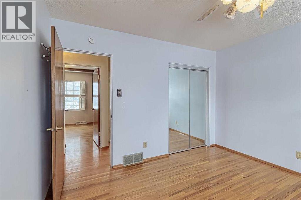 Single Family House Bi-level for Sale in  Woodland Crescent SE Willow Park Calgary 