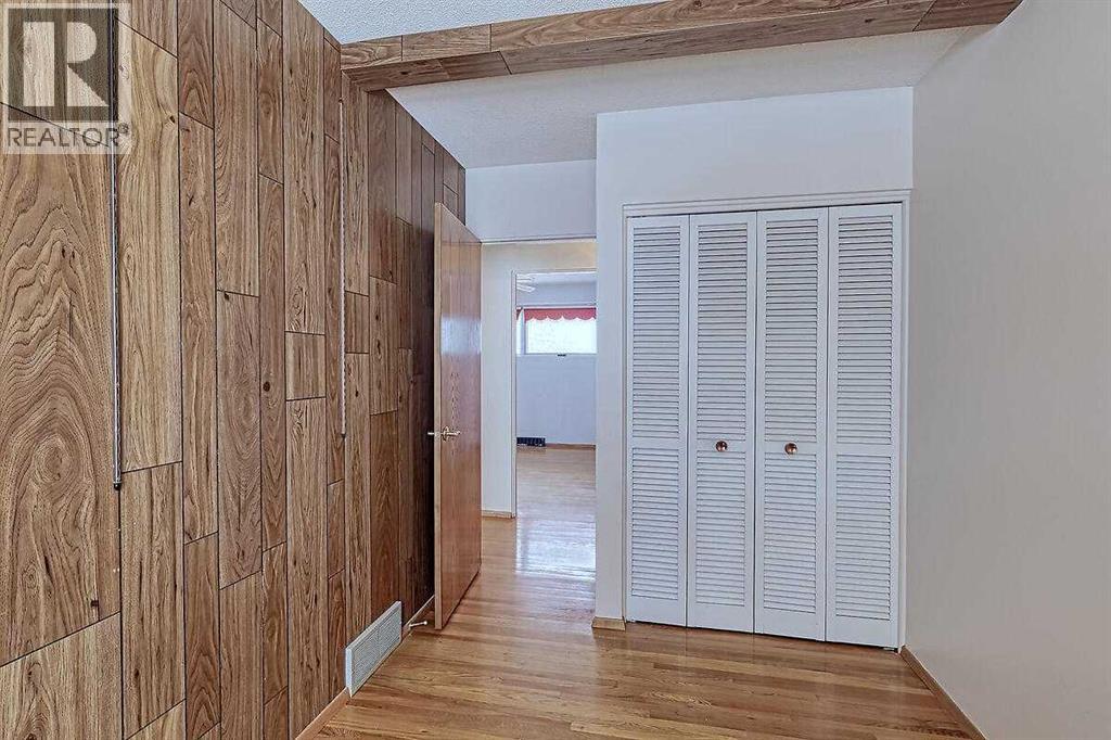 Single Family House Bi-level for Sale in  Woodland Crescent SE Willow Park Calgary 