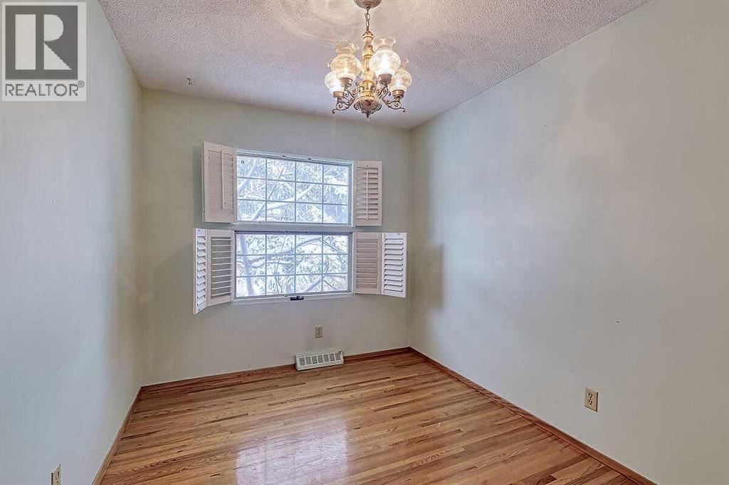 Single Family House Bi-level for Sale in  Woodland Crescent SE Willow Park Calgary 