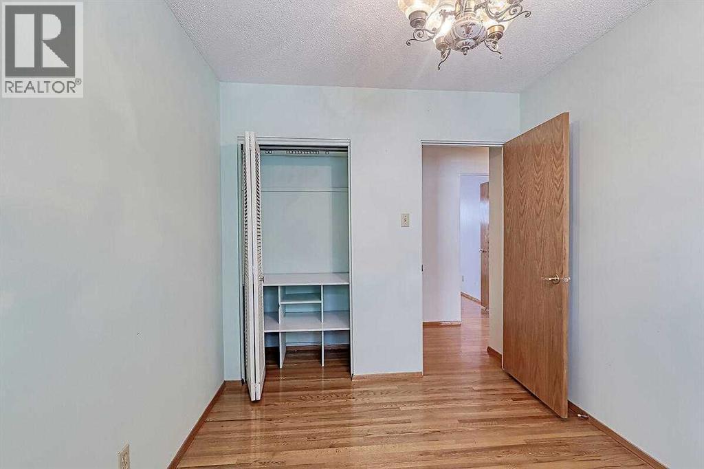 Single Family House Bi-level for Sale in  Woodland Crescent SE Willow Park Calgary 