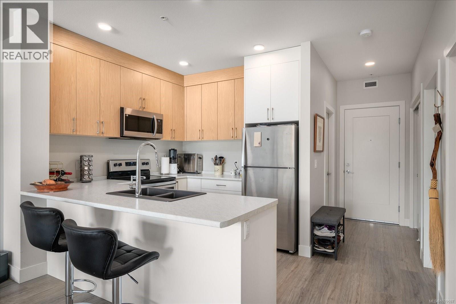 #405 6540 METRAL DR - 6