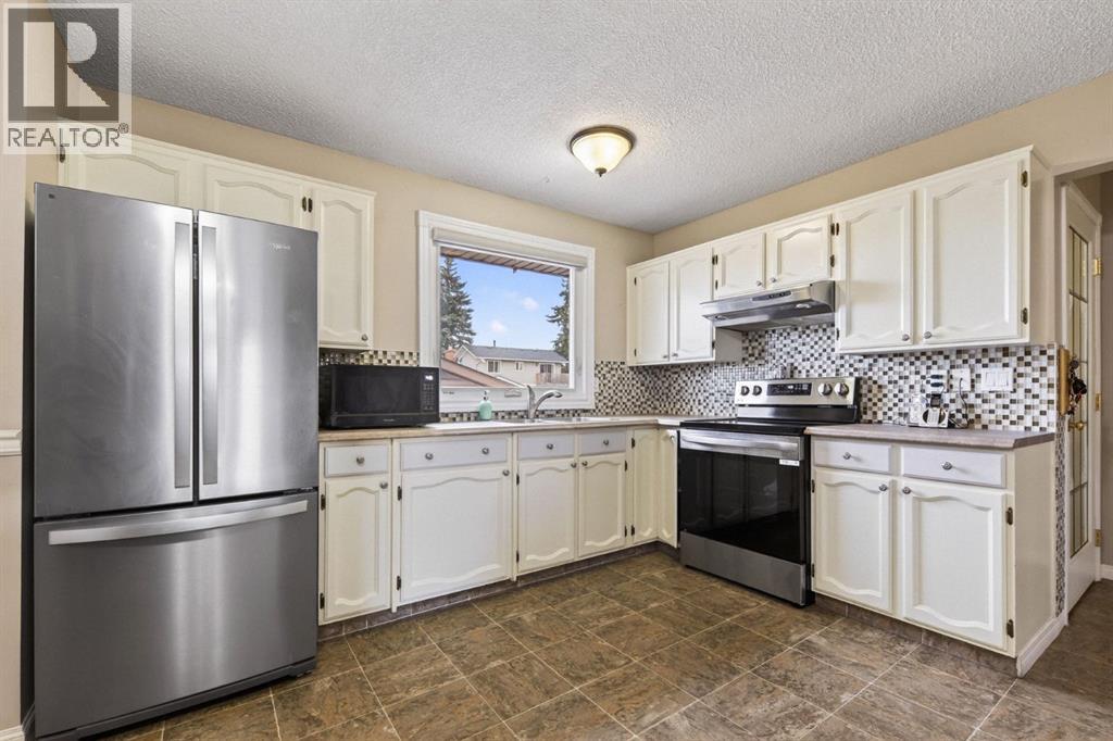 Single Family House Bungalow for Sale in  Queensland Drive SE Queensland Calgary 