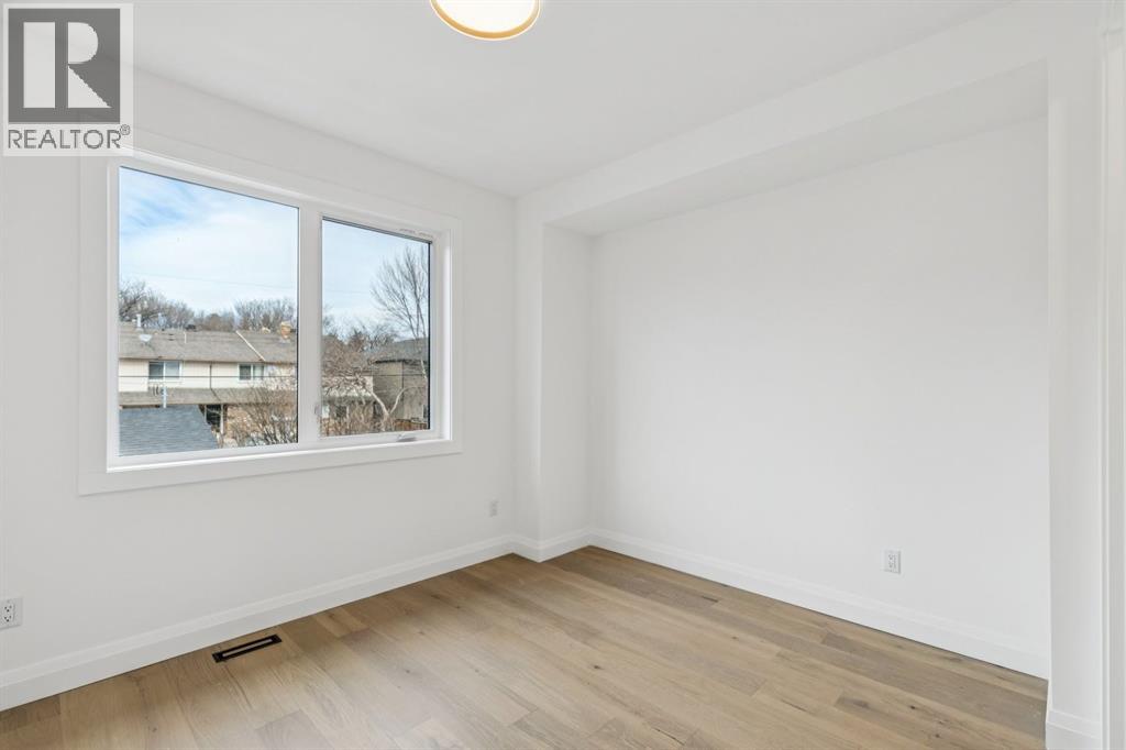 Single Family House for Sale in   Street Parkdale Calgary 