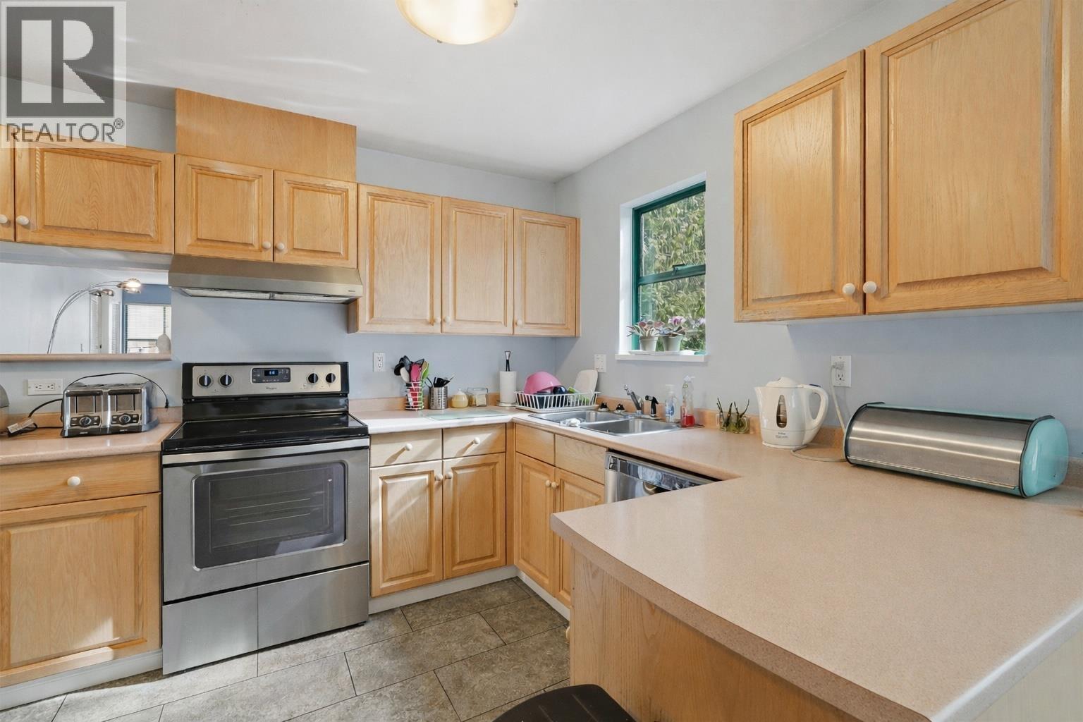 #203-5550 14B Avenue, Delta
