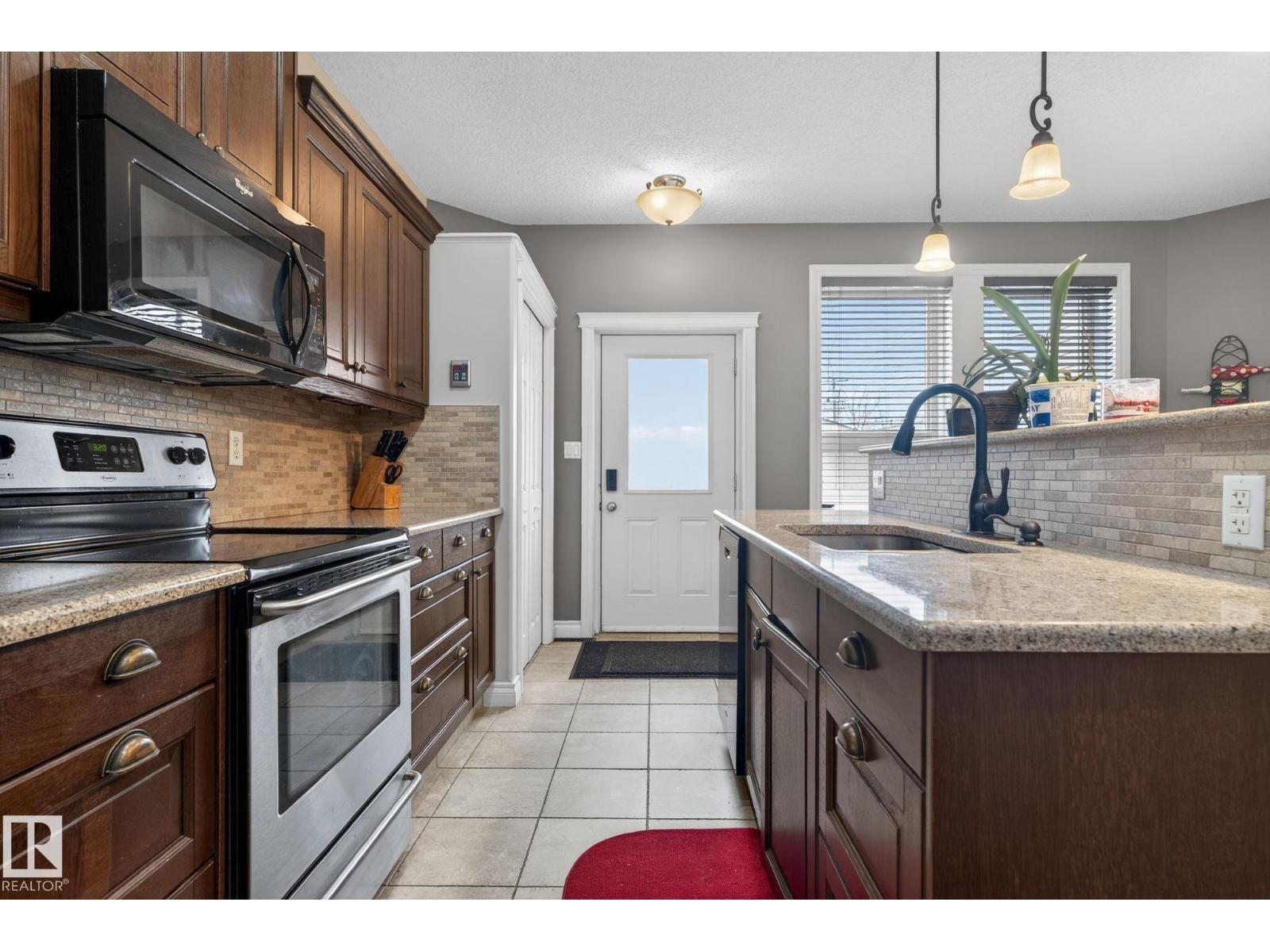 10418 69 AV NW - 11