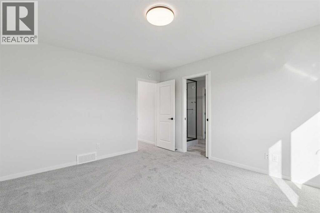 Single Family House for Sale in  Belmont Heath SW Belmont Calgary 