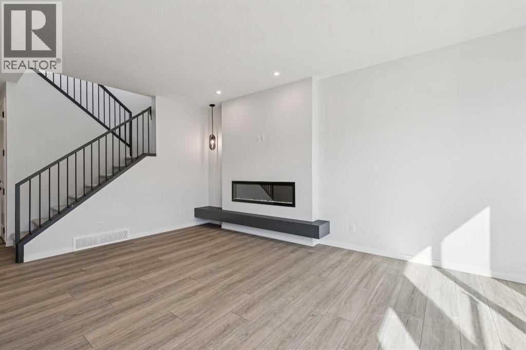 Single Family House for Sale in  Belmont Heath SW Belmont Calgary 