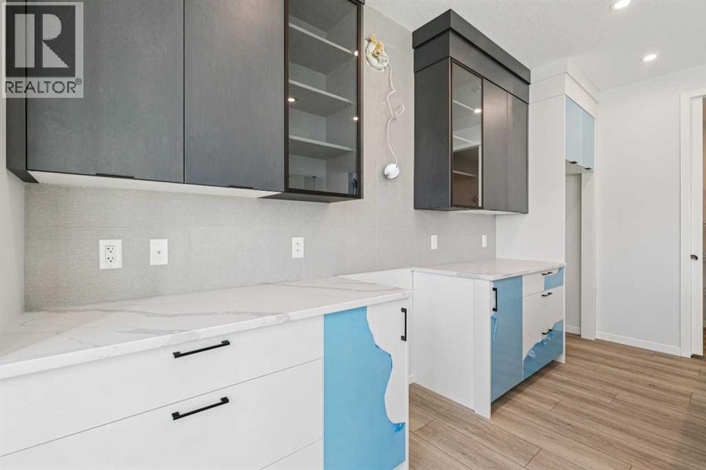 Single Family House for Sale in  Belmont Heath SW Belmont Calgary 