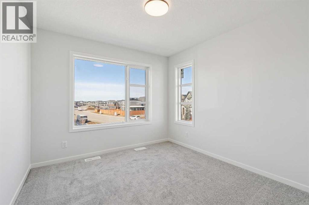 Single Family House for Sale in  Belmont Heath SW Belmont Calgary 