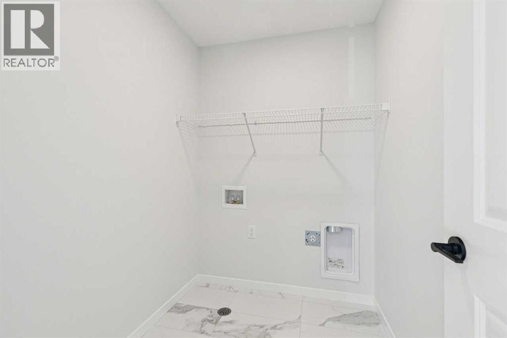 Single Family House for Sale in  Belmont Heath SW Belmont Calgary 