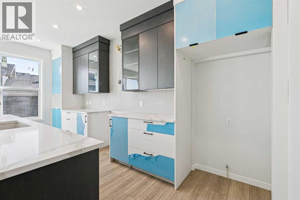 Single Family House for Sale in  Belmont Heath SW Belmont Calgary 