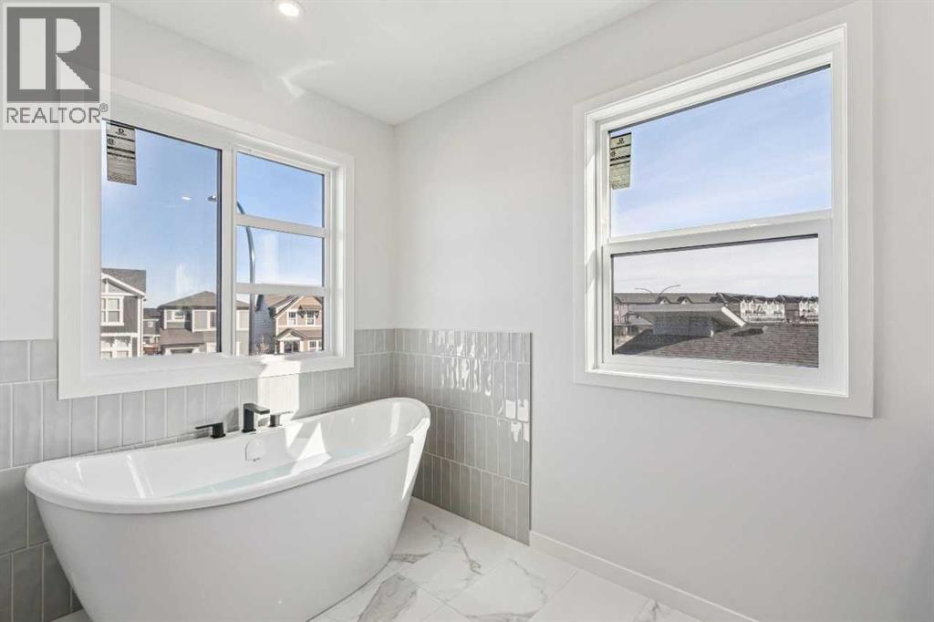 Single Family House for Sale in  Belmont Heath SW Belmont Calgary 