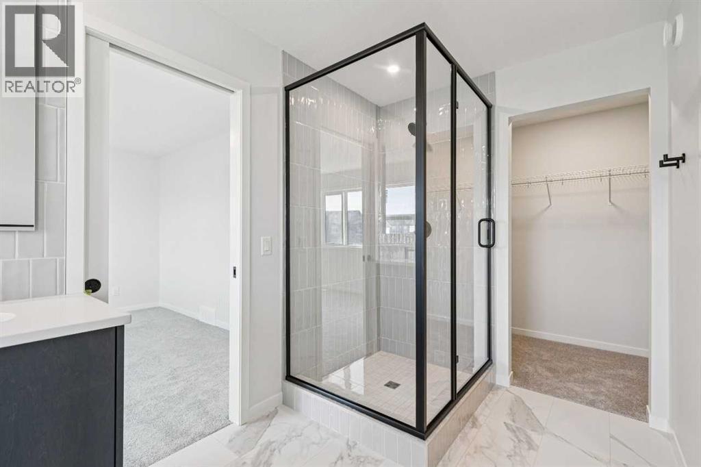 Single Family House for Sale in  Belmont Heath SW Belmont Calgary 