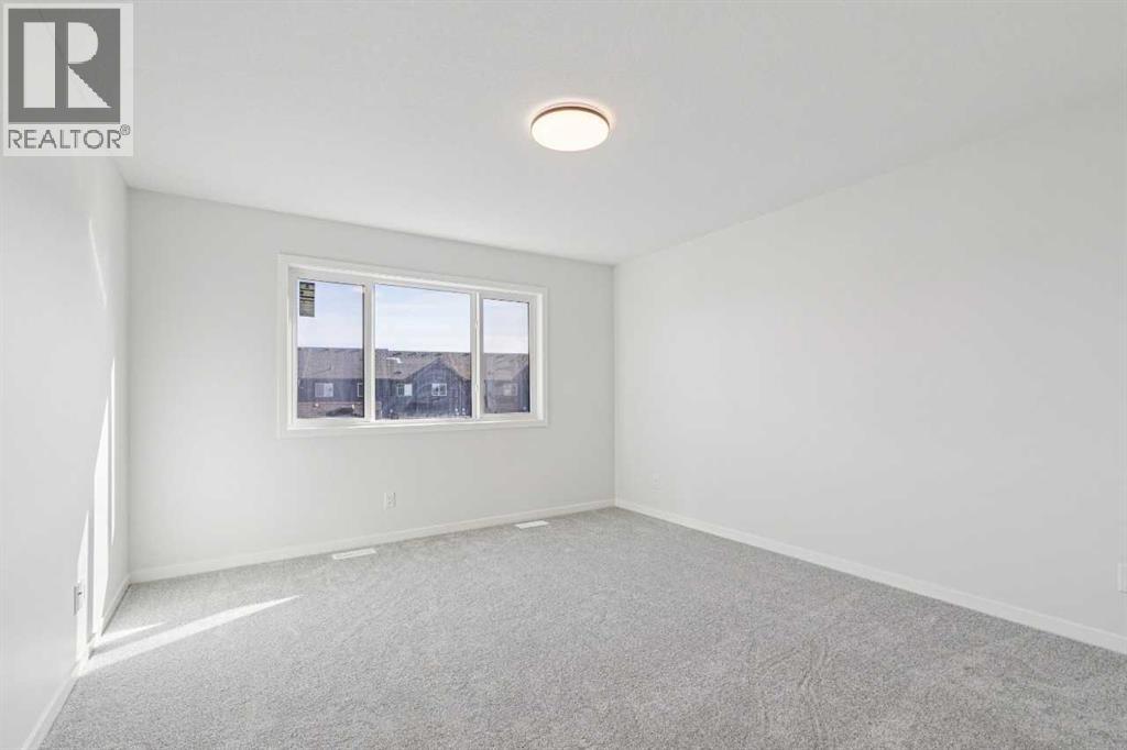 Single Family House for Sale in  Belmont Heath SW Belmont Calgary 