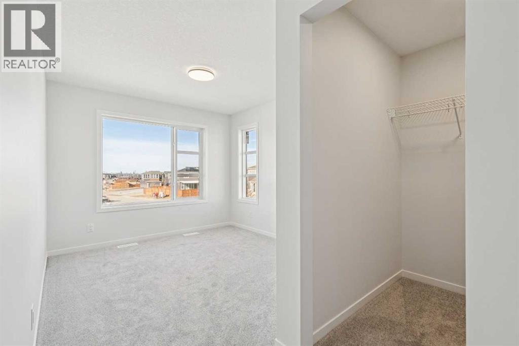 Single Family House for Sale in  Belmont Heath SW Belmont Calgary 