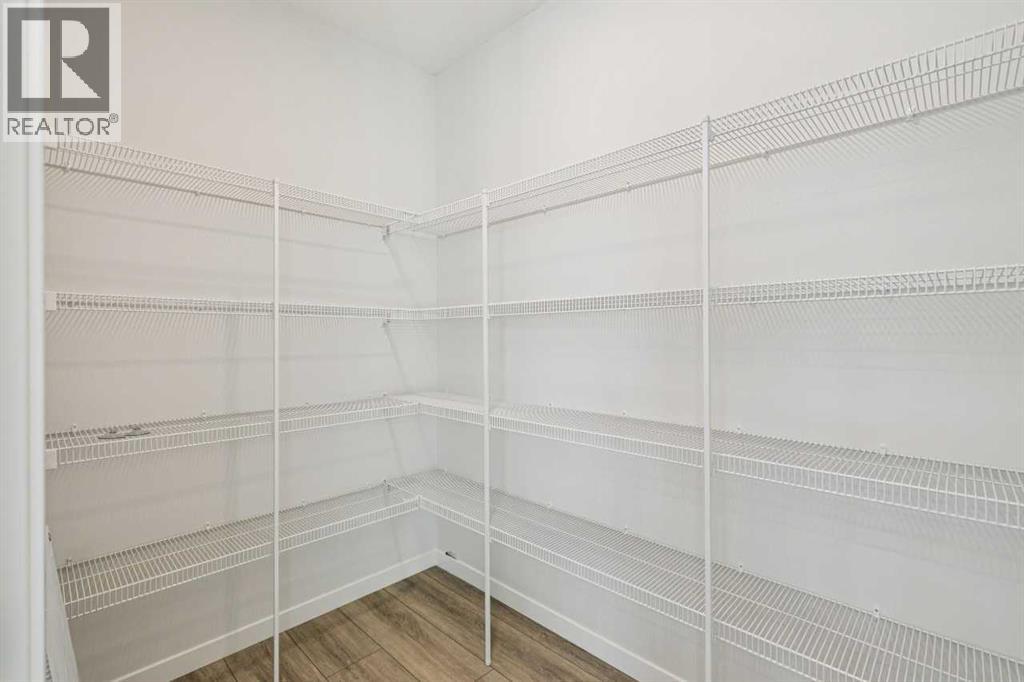 Single Family House for Sale in  Belmont Heath SW Belmont Calgary 