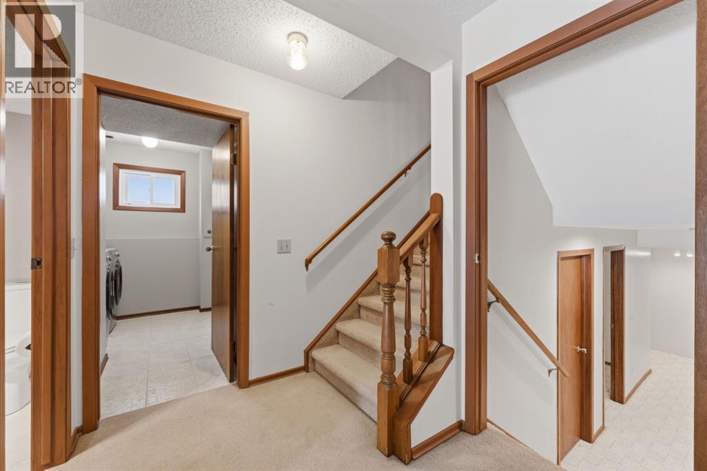 Single Family House 4 Level for Sale in  Woodstock Way SW Woodlands Calgary 