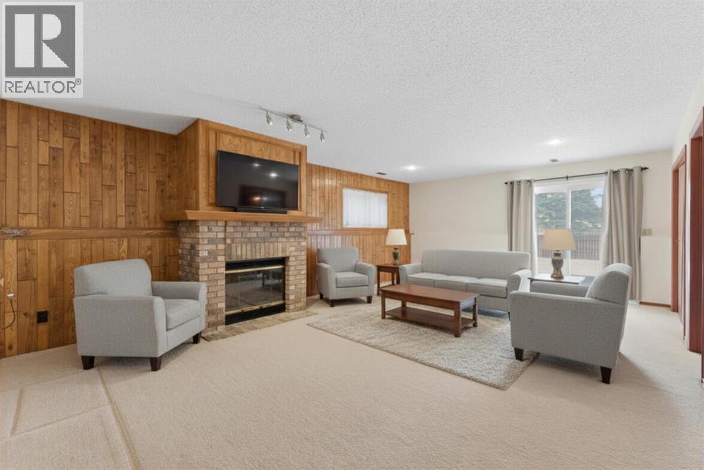 Single Family House 4 Level for Sale in  Woodstock Way SW Woodlands Calgary 