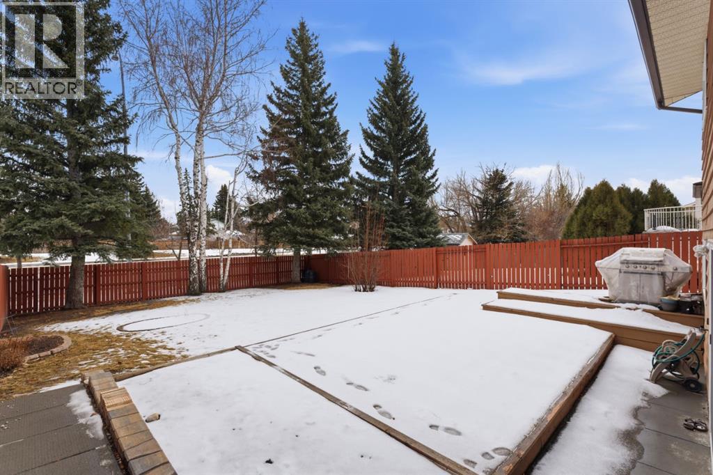 Single Family House 4 Level for Sale in  Woodstock Way SW Woodlands Calgary 