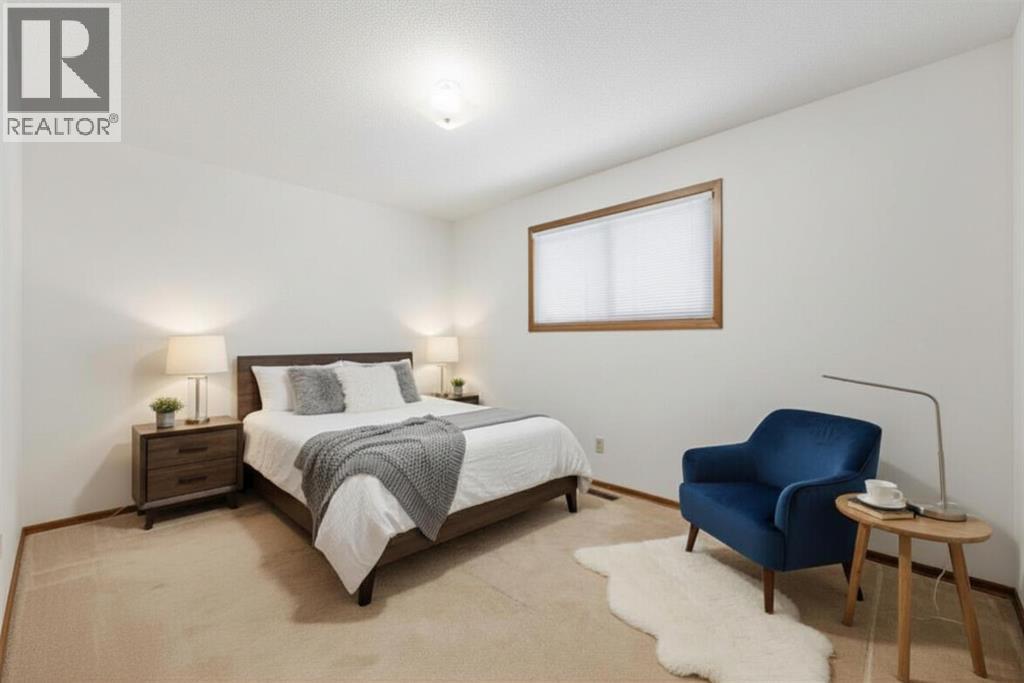 Single Family House 4 Level for Sale in  Woodstock Way SW Woodlands Calgary 