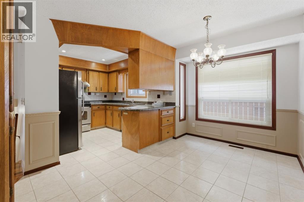 Single Family House 4 Level for Sale in  Woodstock Way SW Woodlands Calgary 