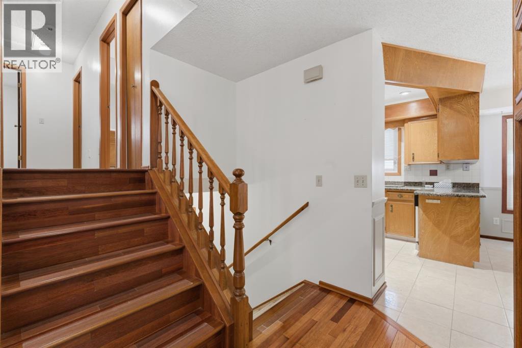 Single Family House 4 Level for Sale in  Woodstock Way SW Woodlands Calgary 