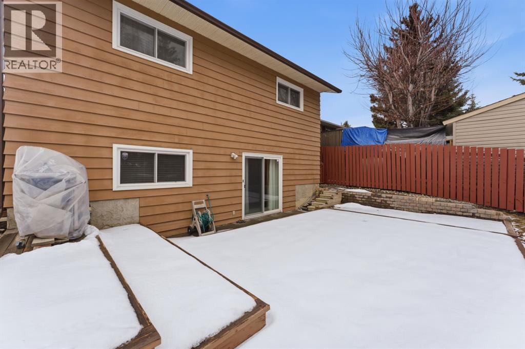 Single Family House 4 Level for Sale in  Woodstock Way SW Woodlands Calgary 