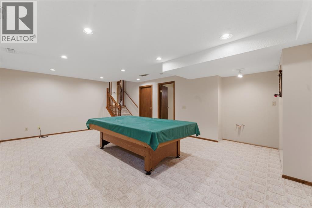 Single Family House 4 Level for Sale in  Woodstock Way SW Woodlands Calgary 