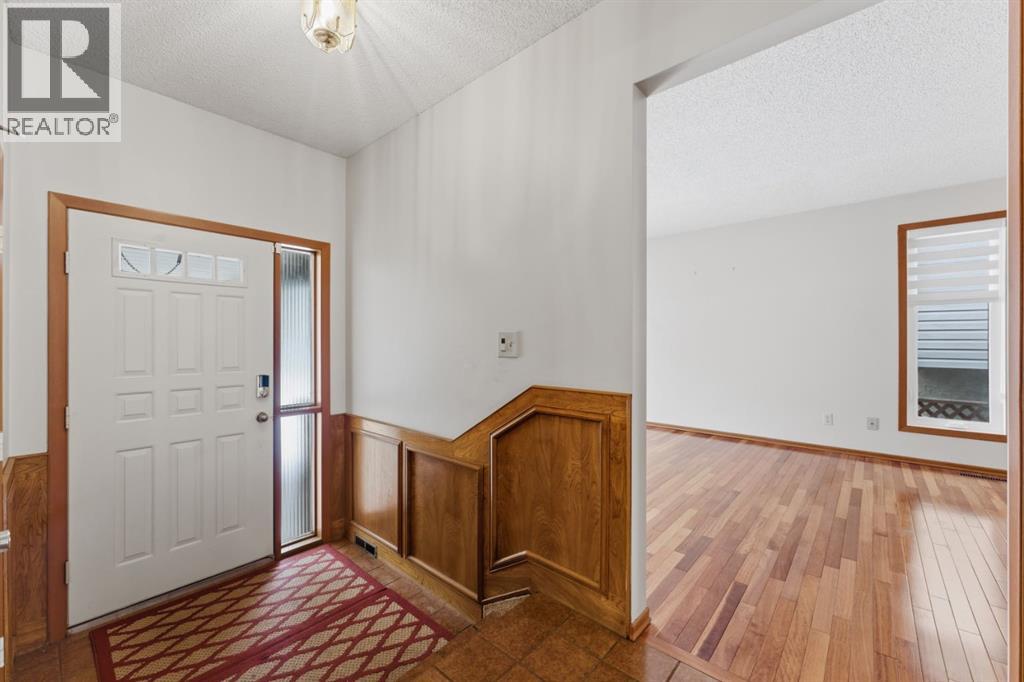 Single Family House 4 Level for Sale in  Woodstock Way SW Woodlands Calgary 