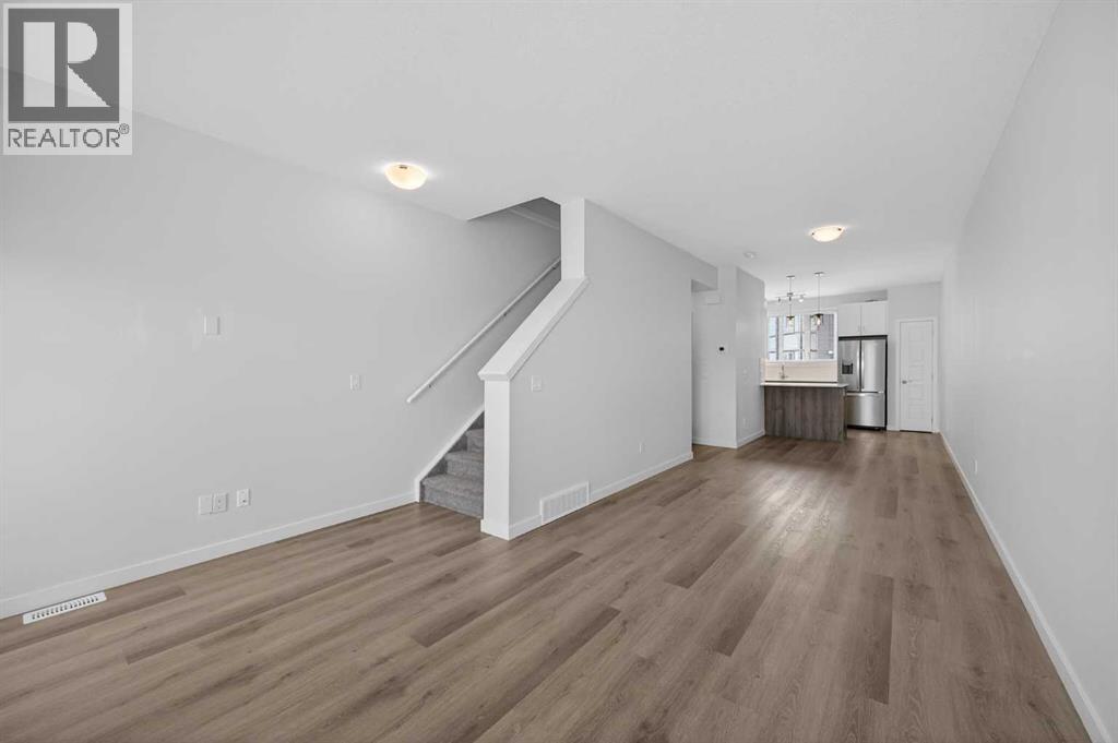 Single Family House for Sale in  Belmont Drive SW Belmont Calgary 