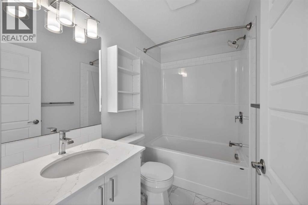 Single Family House for Sale in  Belmont Drive SW Belmont Calgary 