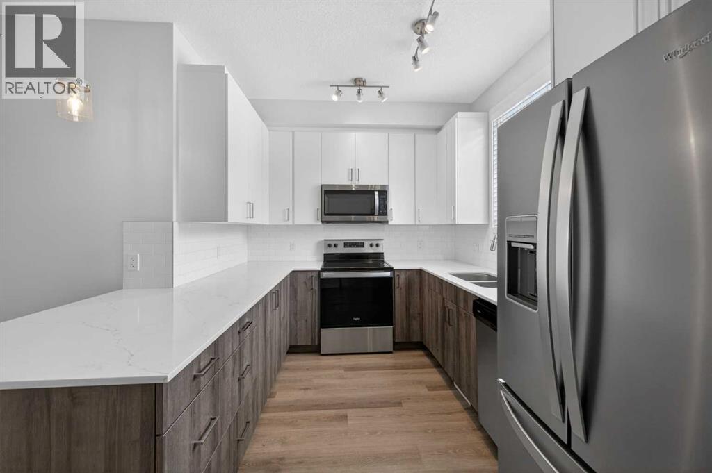 Single Family House for Sale in  Belmont Drive SW Belmont Calgary 