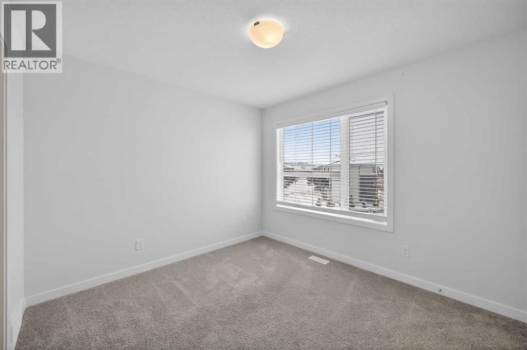 Single Family House for Sale in  Belmont Drive SW Belmont Calgary 