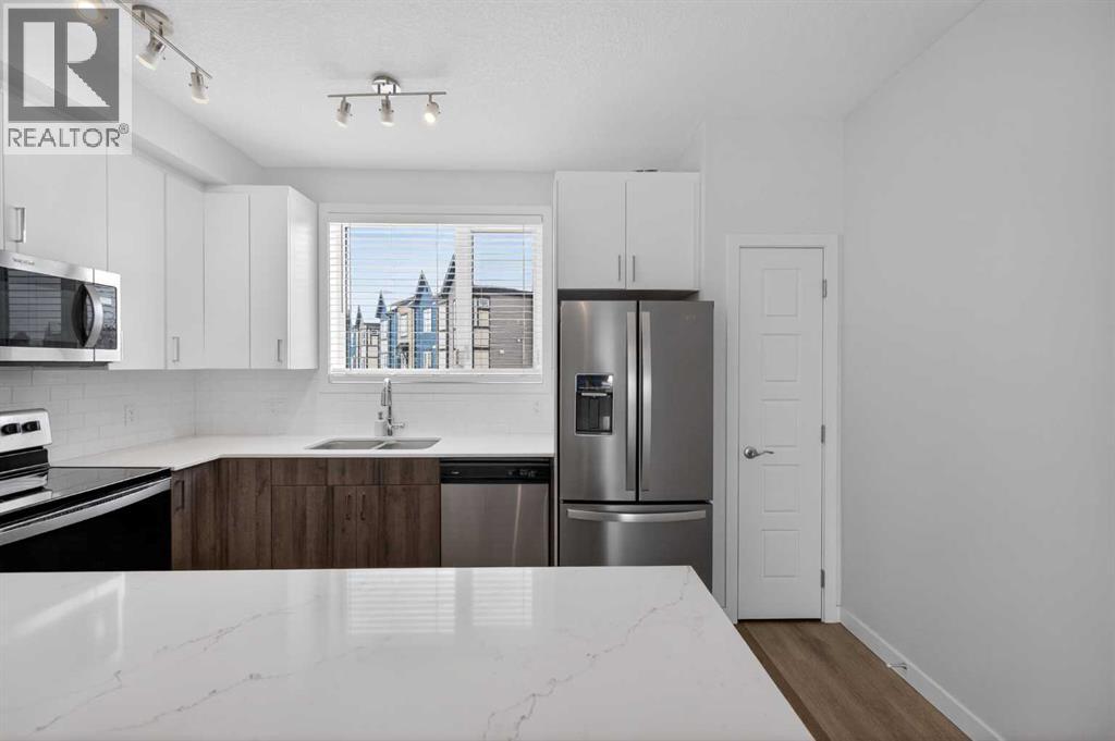 Single Family House for Sale in  Belmont Drive SW Belmont Calgary 