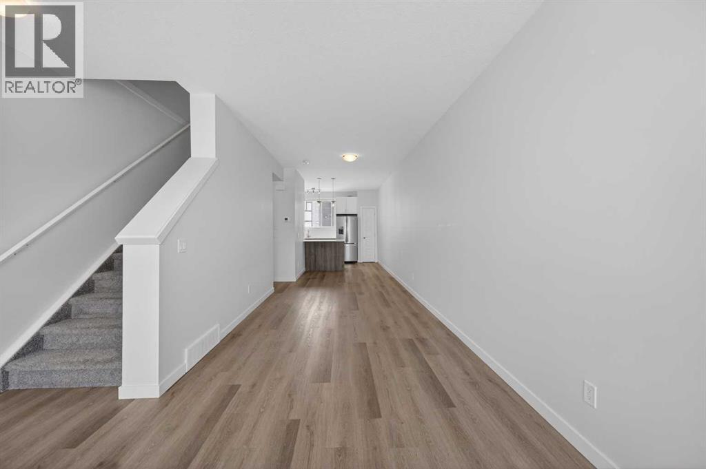 Single Family House for Sale in  Belmont Drive SW Belmont Calgary 